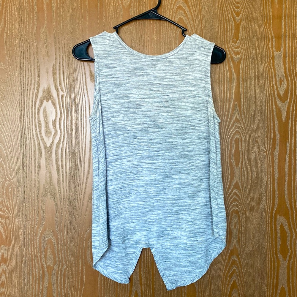 Light grey tank top with slit opening in back